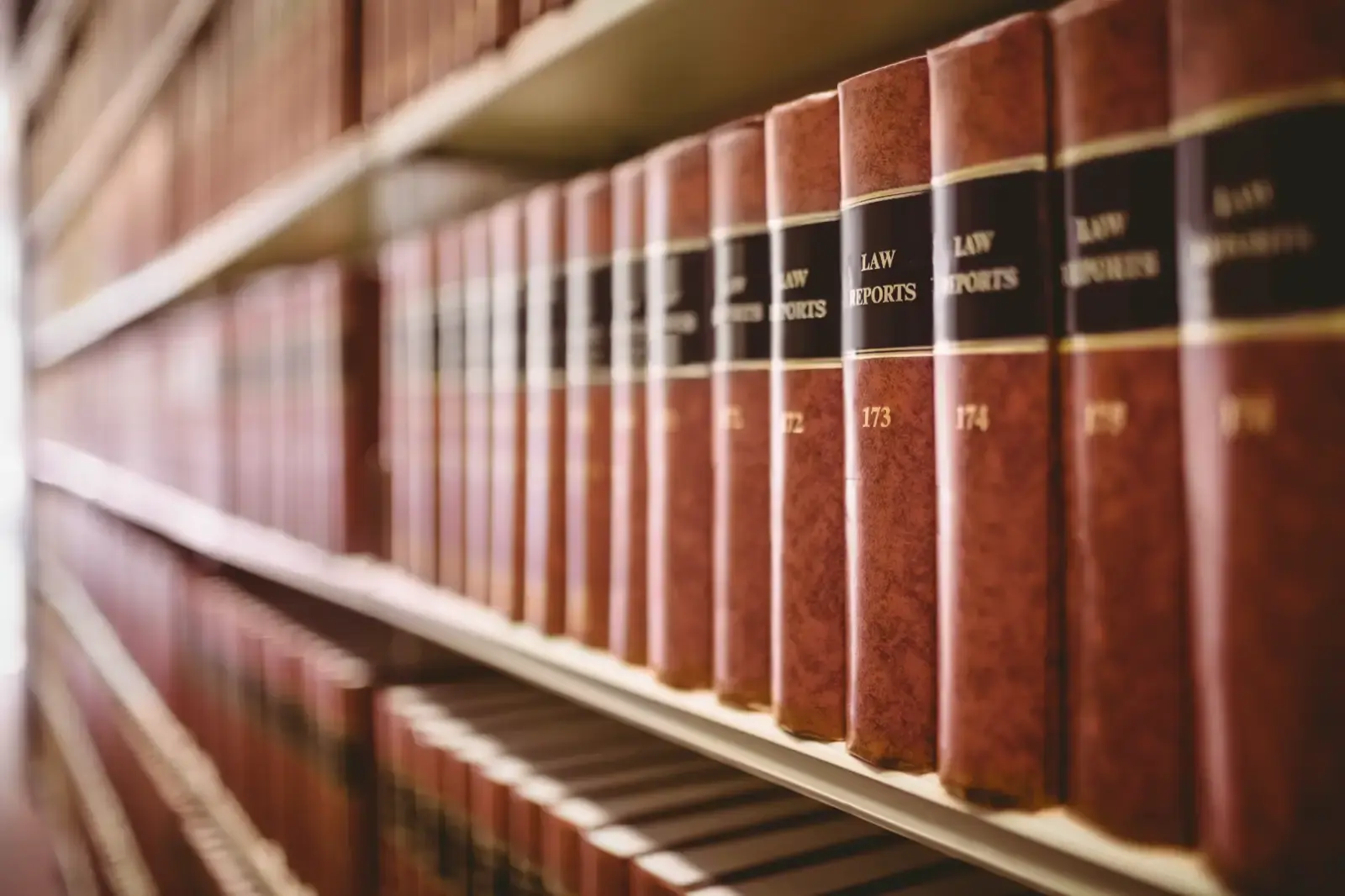 Close up of a lot of law reports in library.